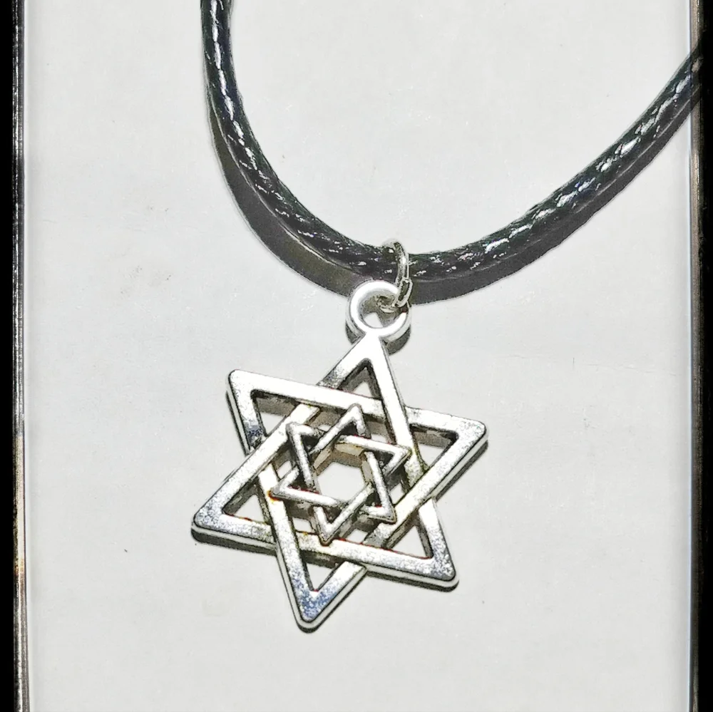 Silver Tone Star with Black Cord Necklace